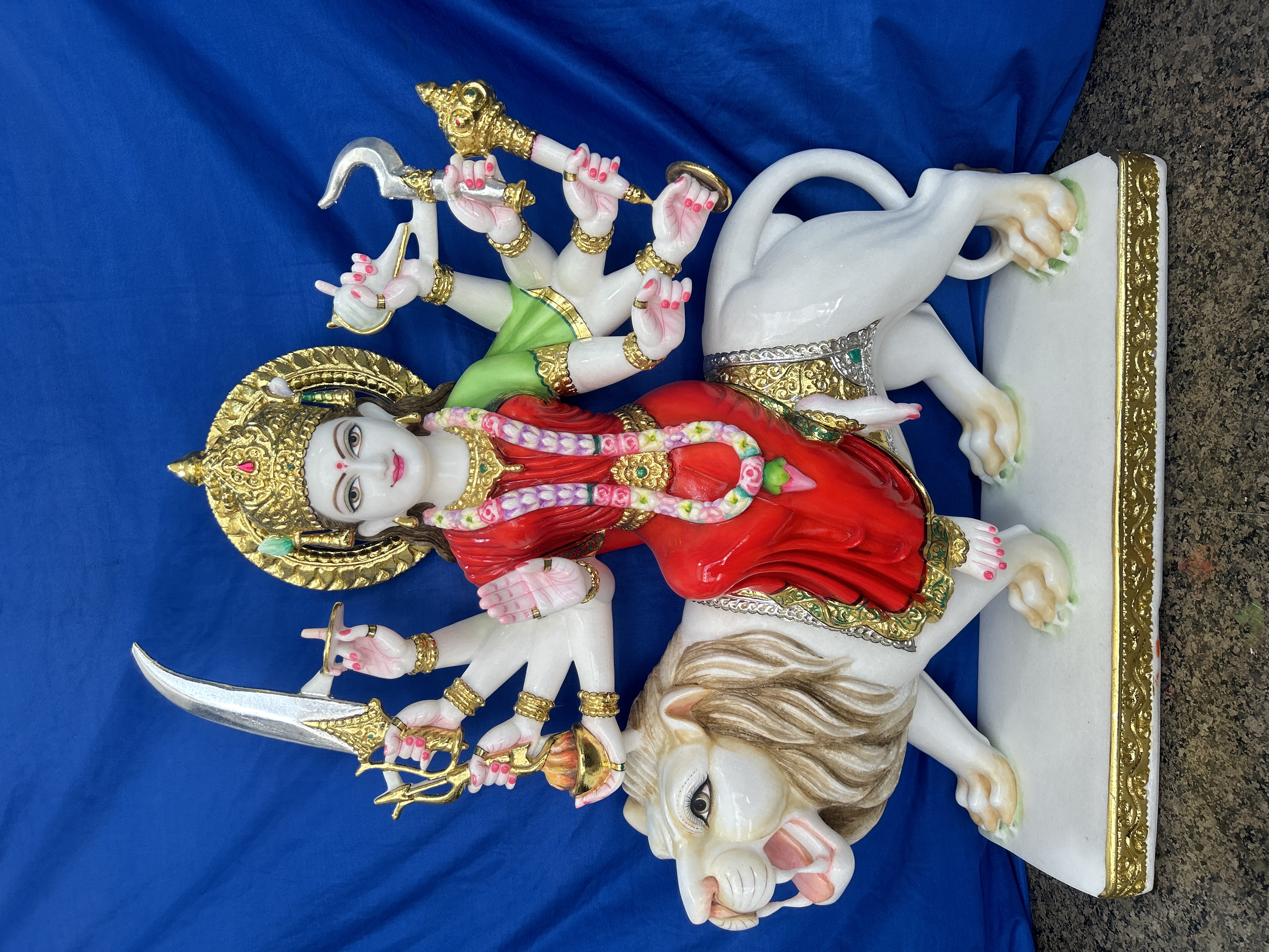 Red Durga Mata on Lion Statue